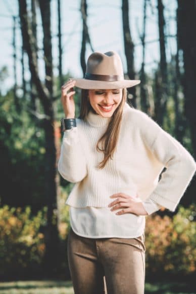 Sweater, Shirt & Hat: Erica Wilson; Pants & Cuff: The Lovely; Earrings: Zero Main