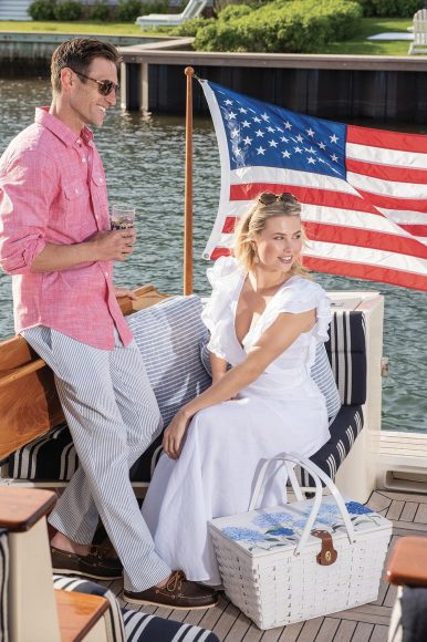 PILLOWS, JEWELRY, PICNIC BASKET: Centre Pointe 
ON HIM — SHIRT: Vineyard Vines, PANTS, SHOES: Murray's Toggery, SUNGLASSES: ACK Eye 
ON HER — DRESS: Milly & Grace, SUNGLASSES: ACK Eye