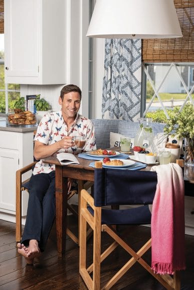 PILLOWS, THROW, GLASSWARE, TABLETOP, PLACEMATS: Centre Pointe 
ON HIM — SHIRT: Murray's Toggery, PANTS: Vineyard Vines