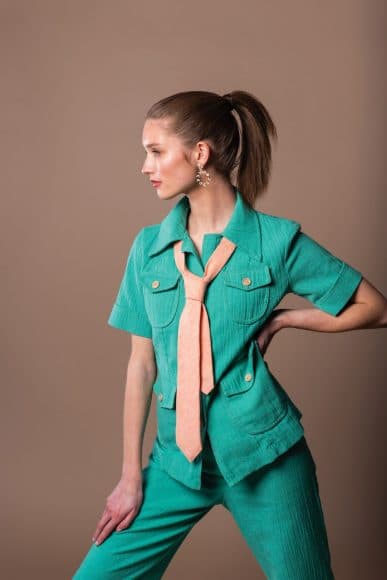 PANTSUIT: currentVintage
TIE: Murray’s Toggery Shop 
EARRINGS: Centre Pointe