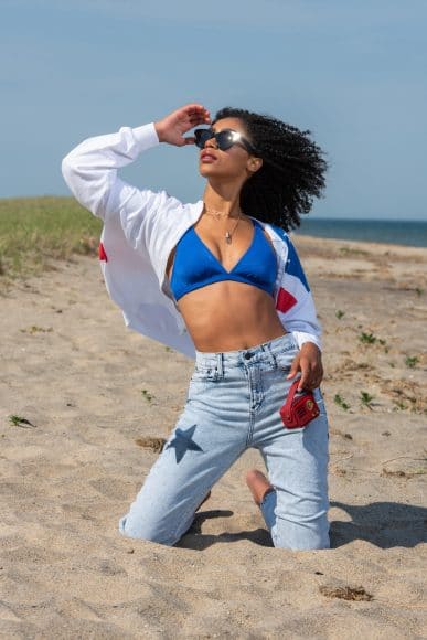 JACKET: currentVintage JEANS: The Skinny Dip SPEAKER: Murray’s Toggery Shop SUNGLASSES: Milly & Grace PENDANT NECKLACE: The Vault CHOKER: Milly & Grace BATHING SUIT TOP: Model’s Own 